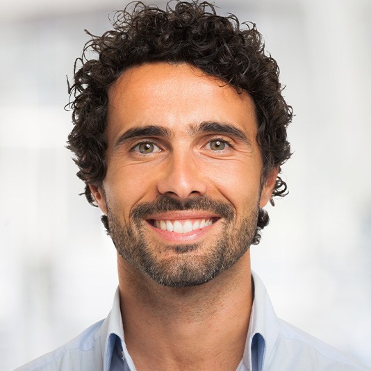 Man smiling after teeth whitening in Slidell