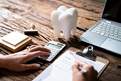 Patient in Slidell making a budget for cosmetic dentistry